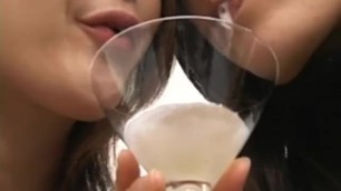 Two Japanese Ladies Spit in a Glass and Feed the Full Glass to their Slave