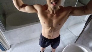 Muscled Guy Flexes and Spreads Cum all over his Hard Body after a Workout