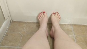 Pretty Red Toenails. Rubbing my Feet